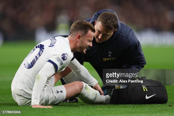 James Maddison of Tottenham Hotspur goes down with an injury during the Premier League match between Tottenham Hotspur and Chelsea FC at Tottenham...