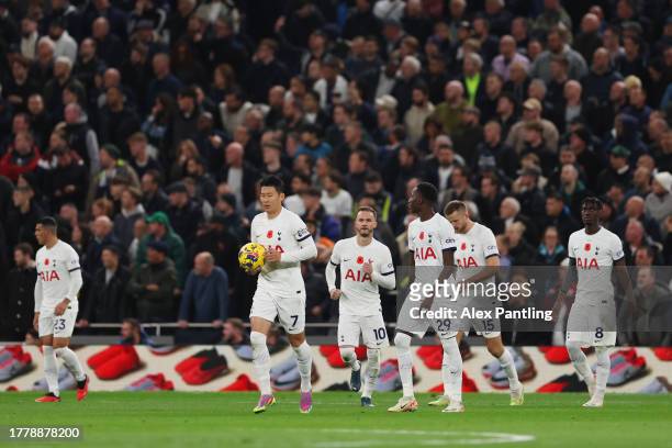 Tottenham Hotspur players react after Chelsea scored their sides first goal during the Premier League match between Tottenham Hotspur and Chelsea FC...