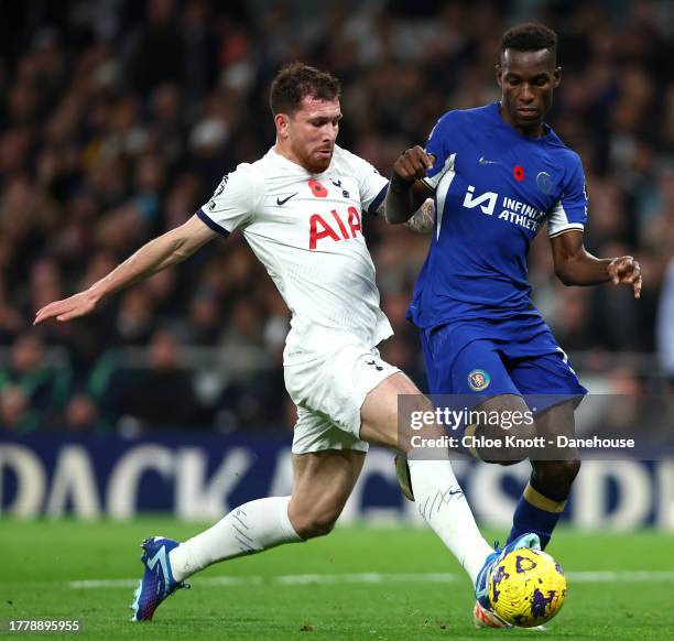 Pierre Emile Hojbjerg of Tottenham Hotspur and Nicolas Jackson of Chelsea battle for the ball during the Premier League match between Tottenham...