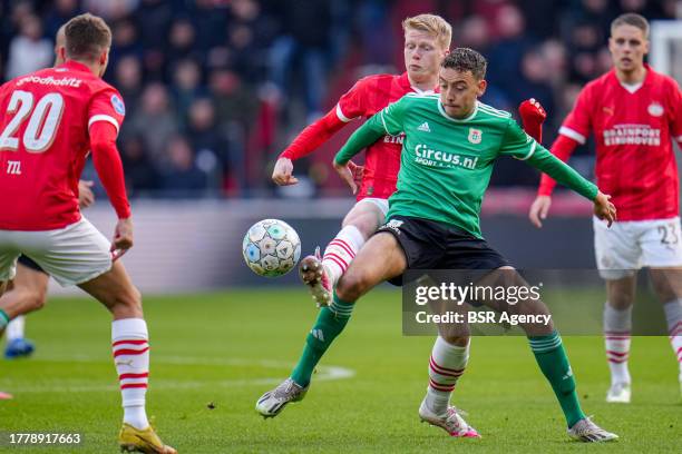 Ricardo Pepi of PSV battles for possession with Zico Buurmeester of PEC Zwolle during the Dutch Eredivisie match between PSV and PEC Zwolle at...