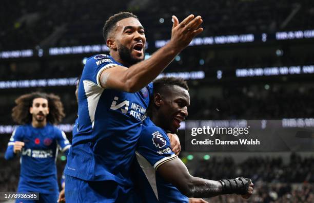 Nicolas Jackson of Chelsea celebrates with teammate Reece James after scoring the team's second goal during the Premier League match between...