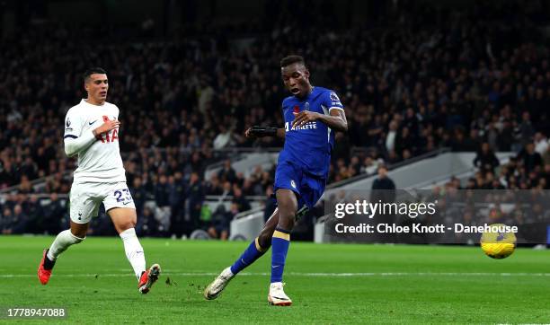 Nicolas Jackson of Chelsea scores their teams third goal during the Premier League match between Tottenham Hotspur and Chelsea FC at Tottenham...