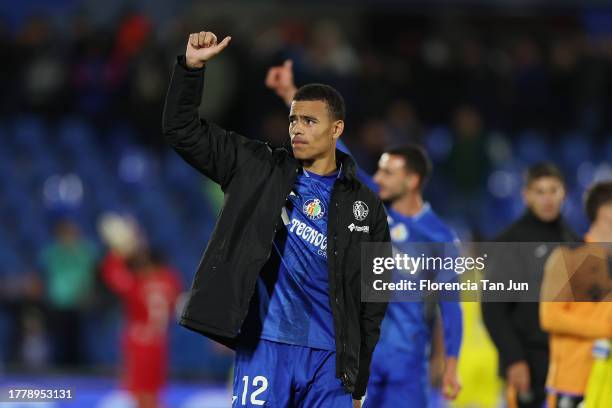 Mason Greenwood of Getafe CF shows appreciation to the fans at full-time after their team's victory in the LaLiga EA Sports match between Getafe CF...