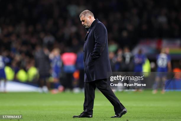 Ange Postecoglou, Manager of Tottenham Hotspur, looks dejected following the team's defeat during the Premier League match between Tottenham Hotspur...