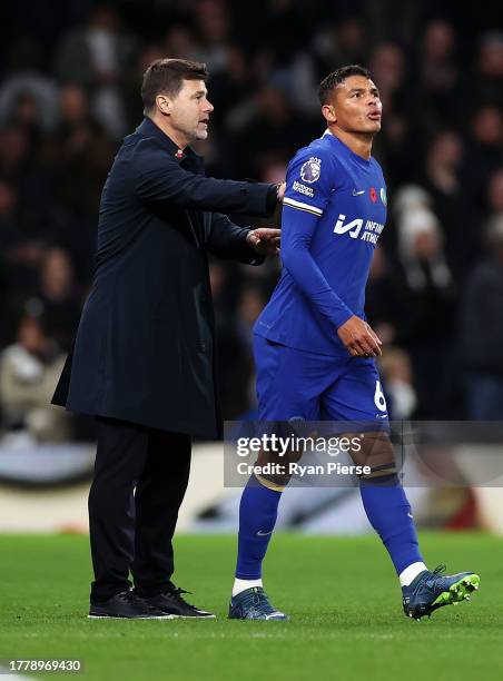 Thiago Silva of Chelsea and Mauricio Pochettino, Manager of Chelsea, interact during the Premier League match between Tottenham Hotspur and Chelsea...