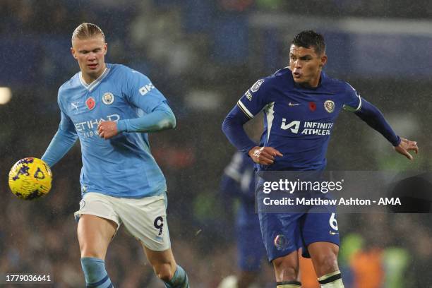 Erling Haaland of Manchester City and Thiago Silva of Chelsea during the Premier League match between Chelsea FC and Manchester City at Stamford...