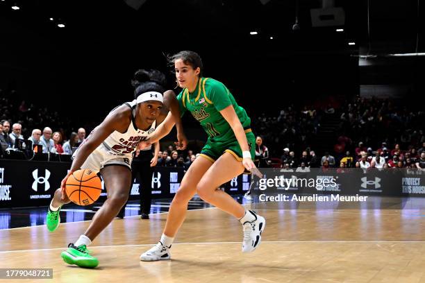 Raven Johnson of South Carolina runs with the ball during the Aflac Oui Play match between South Carolina and Notre Dame at Halle Georges Carpentier...