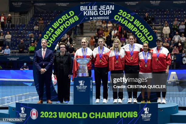 Team Canada stand on the podium with US tennis star Billie Jean King during the trophy ceremony after winning the Billie Jean King Cup Finals 2023 in...