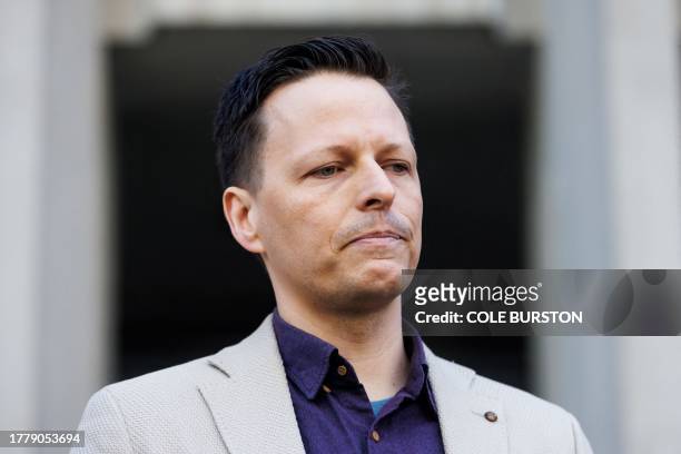 Kai Bickle-Nygard, son of former fashion mogul Peter Nygard, addresses media outside the Toronto courthouse in Toronto on November 12, 2023 after his...