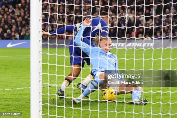 Manchester City's Erling Haaland scores their third goal during the Premier League match between Chelsea FC and Manchester City at Stamford Bridge on...