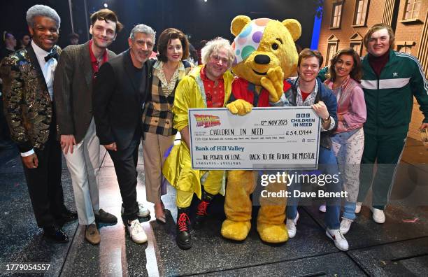 Pudsey poses backstage with Jay Perry, Oliver Nicholas, Gary Davies, Sarah Goggin, Lee Ormsby, Ben Joyce, Sophie Naglik and Jordan Pearson at the...