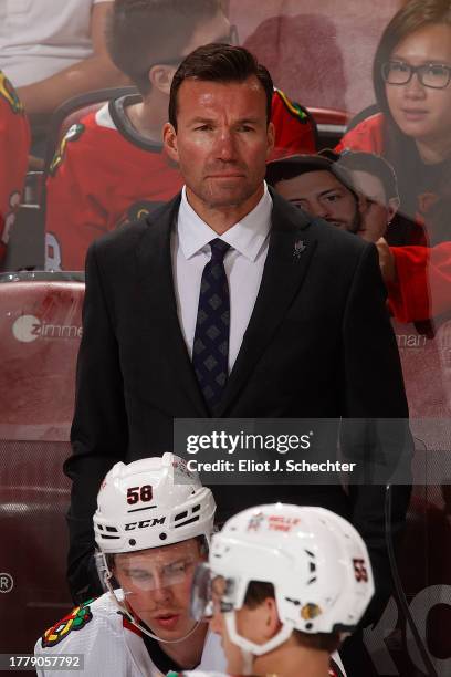 Chicago Blackhawks Head Coach Luke Richardson monitors game progress against the Florida Panthers at the Amerant Bank Arena on November 12, 2023 in...