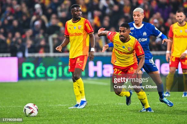 Amine HARIT of Marseille and Wesley SAID of Lens during the Ligue 1 Uber Eats match between Racing Club de Lens and Olympique de Marseille at Stade...