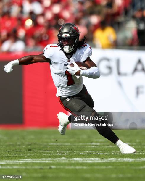 Rachaad White of the Tampa Bay Buccaneers carries the ball during the second quarter of an NFL football game against the Tennessee Titans at Raymond...