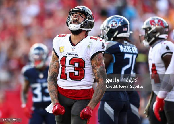 Mike Evans of the Tampa Bay Buccaneers celebrates after scoring a touchdown during the third quarter of an NFL football game against the Tennessee...