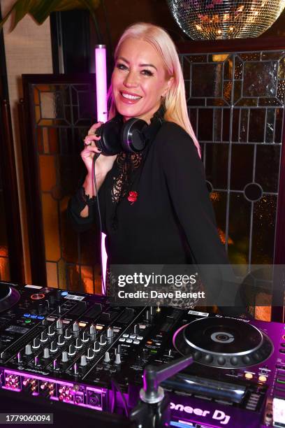 Denise van Outen DJs at the We Free Women x Tamzin Outhwaite launch party at 20 Berkeley, Mayfair on November 12, 2023 in London, England.