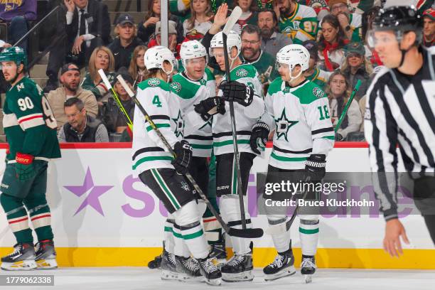 Miro Heiskanen, Ryan Suter, Radek Faksa and Sam Steel of the Dallas Stars celebrate a goal against the Minnesota Wild during the game at the Xcel...
