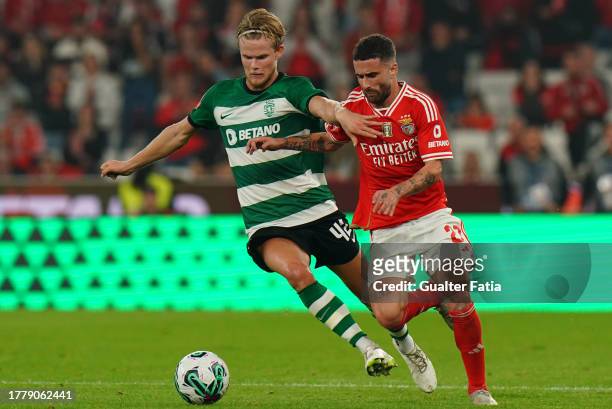 Rafa Silva of SL Benfica with Morten Hjulmand of Sporting CP in action during the Liga Portugal Betclic match between SL Benfica and Sporting CP at...