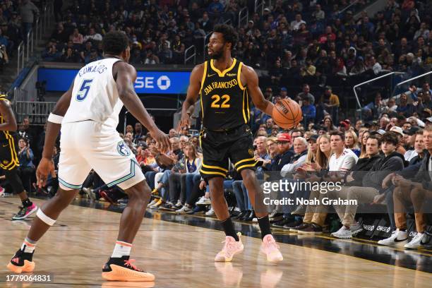 Andrew Wiggins of the Golden State Warriors dribbles the ball during the game against the Minnesota Timberwolves on November 12, 2023 at Chase Center...