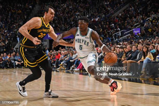 Anthony Edwards of the Minnesota Timberwolves dribbles the ball during the game against the Golden State Warriors on November 12, 2023 at Chase...
