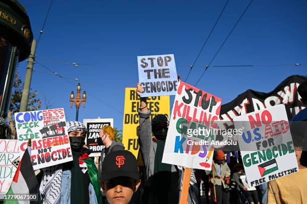 Pro-Palestine protestors and protesters of Asia-Pacific Economic Cooperation global trade summit are gathered near the Ferry Building and marched...
