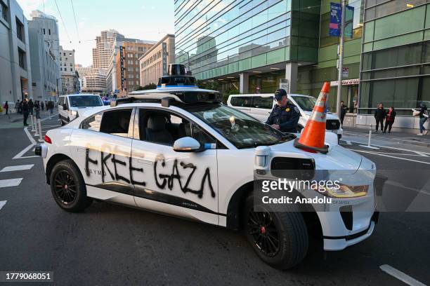 Waymo self-driving car that was vandalized is seen as Pro-Palestine protestors and protesters of Asia-Pacific Economic Cooperation global trade...