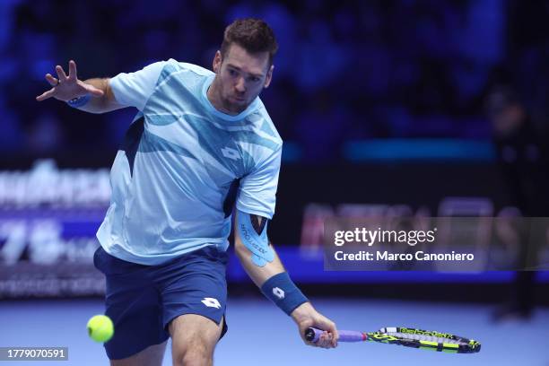 Austin Krajicek of USA in action during the Round Robin doubles match between Ivan Dodig of Croatia and Austin Krajicek of USA against Maximo...