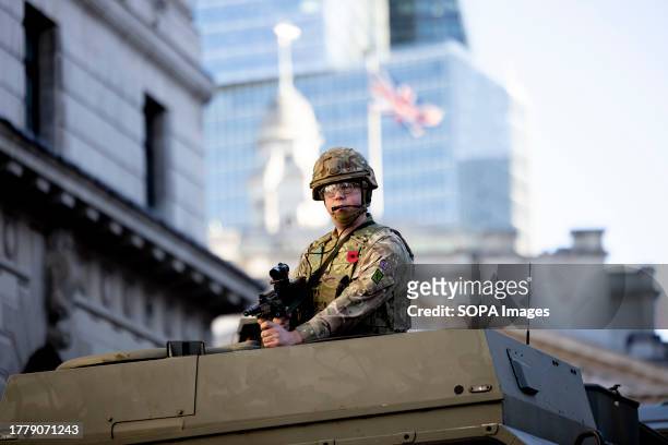 Soldier is seen on top of a military tank during the procession to celebrate the new Lord Mayor of London of the year. The Lord Mayor's Show is a...