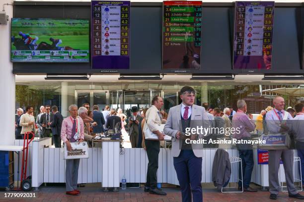 Bookmakers wait for customers in the betting ring during Melbourne Cup Day at Flemington Racecourse on November 07, 2023 in Melbourne, Australia.