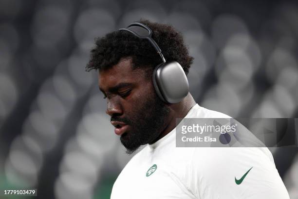 Mekhi Becton of the New York Jets warms up before the game against the Los Angeles Chargers at MetLife Stadium on November 06, 2023 in East...