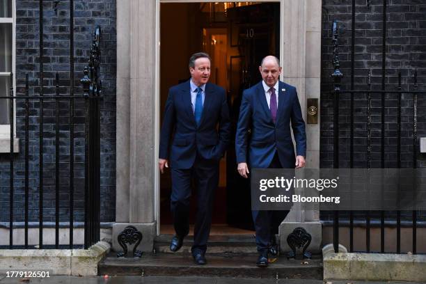 David Cameron, UK foreign secretary, left, departs 10 Downing Street after being appointed in London, UK, on Monday, Nov. 13, 2023. In an unexpected...