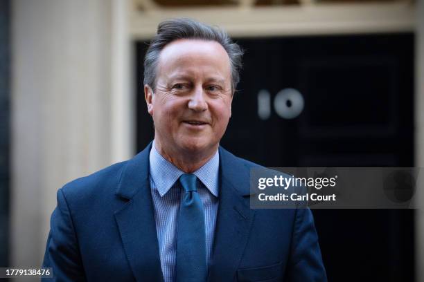 Britain's former Prime Minister, David Cameron, leaves 10, Downing Street after being appointed Foreign Secretary in a Cabinet reshuffle on November...