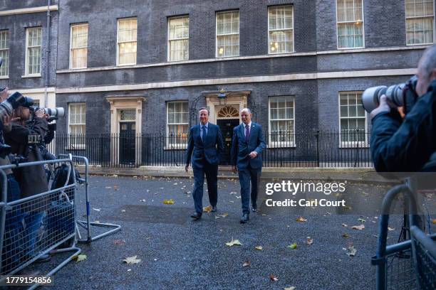 Britain's former Prime Minister, David Cameron leaves 10, Downing Street with Sir Philip Barton, the Permanent Under-Secretary of the Foreign,...