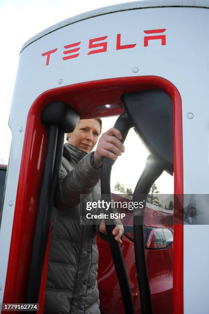 Tesla model Y supercharger charging.