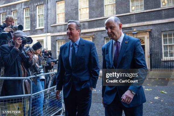 Britain's former Prime Minister, David Cameron , leaves 10 Downing Street with Sir Philip Barton, the Permanent Under-Secretary of the Foreign,...