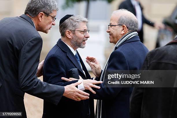 Grand Rabbi of France Haim Korsia , flanked by Archbishop of Reims and President of the Conference des Eveques de France Eric de Moulins-Beaufort ,...