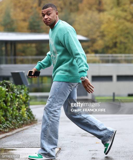 France's forward Kylian Mbappe arrives in Clairefontaine-en-Yvelines on November 13, 2023 as part of the team's preparation for the upcoming UEFA...