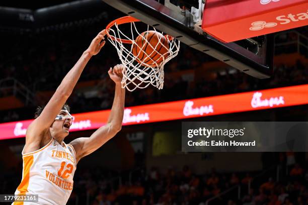 Cade Phillips of the Tennessee Volunteers dunks against the Tennessee Tech Golden Eagles in the second half at Thompson-Boling Arena on November 06,...