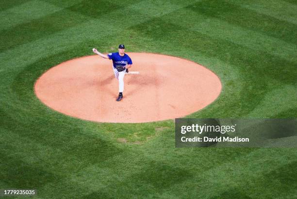 Denny Stark of the Colorado Rockies pitches in a Major League Baseball game against he Los Angeles Dodgers played on June 3, 2002 in Denver, Colorado.