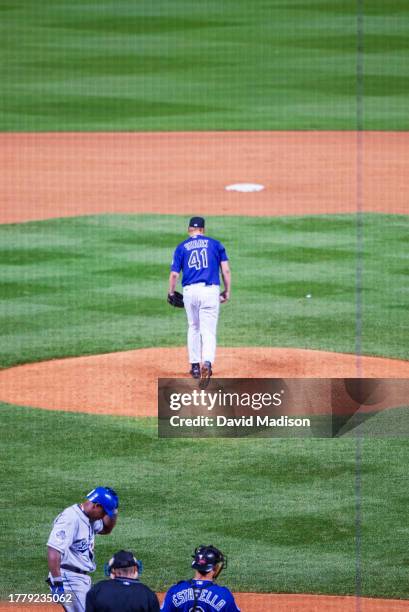 Denny Stark of the Colorado Rockies pitches in a Major League Baseball game against he Los Angeles Dodgers played on June 3, 2002 in Denver, Colorado.