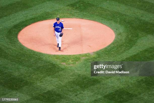 Denny Stark of the Colorado Rockies pitches in a Major League Baseball game against he Los Angeles Dodgers played on June 3, 2002 in Denver, Colorado.