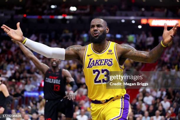 LeBron James of the Los Angeles Lakers reacts during the second quarter of the game against the Miami Heat at Kaseya Center on November 06, 2023 in...