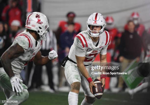 Ole Miss Rebels Quarterback Jaxson Dart pitches the ball during the college football game between the Ole Miss Rebels and the Georgia Bulldogs on...