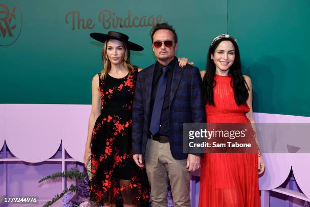 Sharon Corr, Jim Corr and Andrea Corr of The Corrs pose for a photo during 2023 Melbourne Cup Day at Flemington Racecourse on November 07, 2023 in...