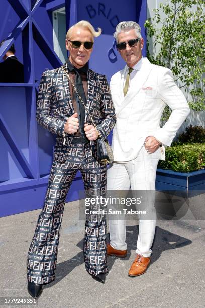 Mitch Edwards and Mark McKie pose for a photo during 2023 Melbourne Cup Day at Flemington Racecourse on November 07, 2023 in Melbourne, Australia.