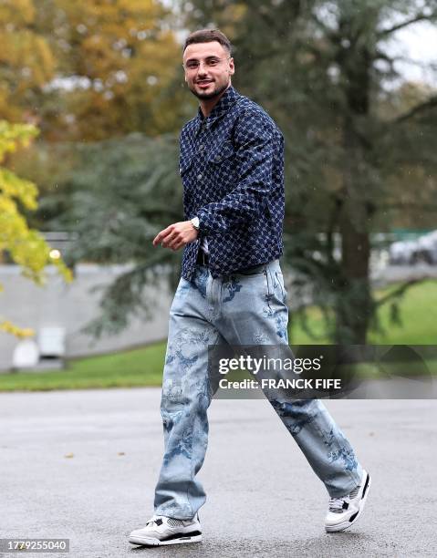 France's defender Jonathan Clauss arrives in Clairefontaine-en-Yvelines on November 13, 2023 as part of the team's preparation for the upcoming UEFA...