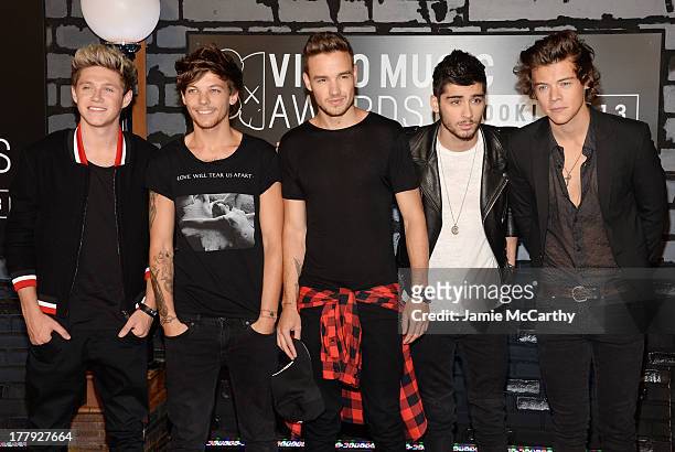 Niall Horan, Louis Tomlinson, Liam Payne, Zayn Malick and Harry Styles of One Direction attend the 2013 MTV Video Music Awards at the Barclays Center...