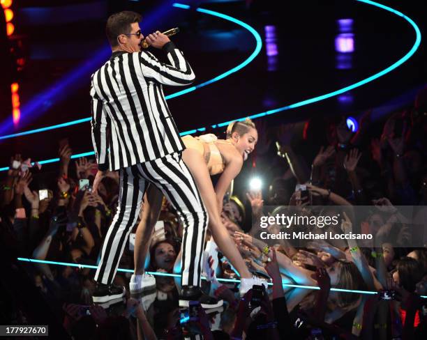 Robin Thicke and Miley Cyrus perform during the 2013 MTV Video Music Awards at the Barclays Center on August 25, 2013 in the Brooklyn borough of New...