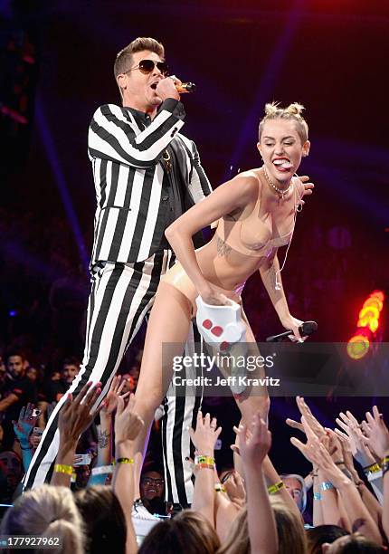 Robin Thicke and Miley Cyrus perform during the 2013 MTV Video Music Awards at the Barclays Center on August 25, 2013 in the Brooklyn borough of New...