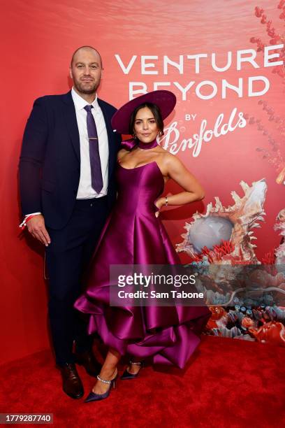 Tom Bellchambers and Olympia Valance pose for a photo during 2023 Melbourne Cup Day at Flemington Racecourse on November 07, 2023 in Melbourne,...